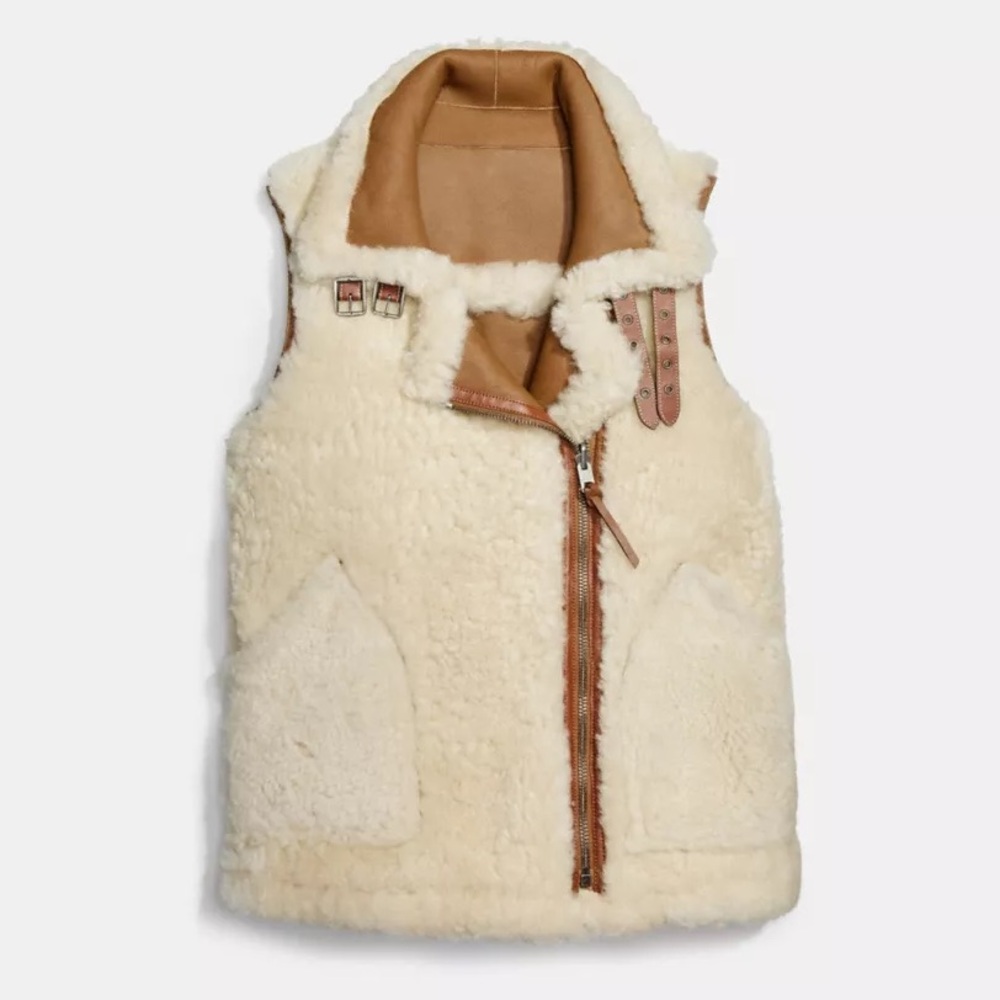 Reversible Shearling Vest by Coach 
‼️Just Sharing‼️